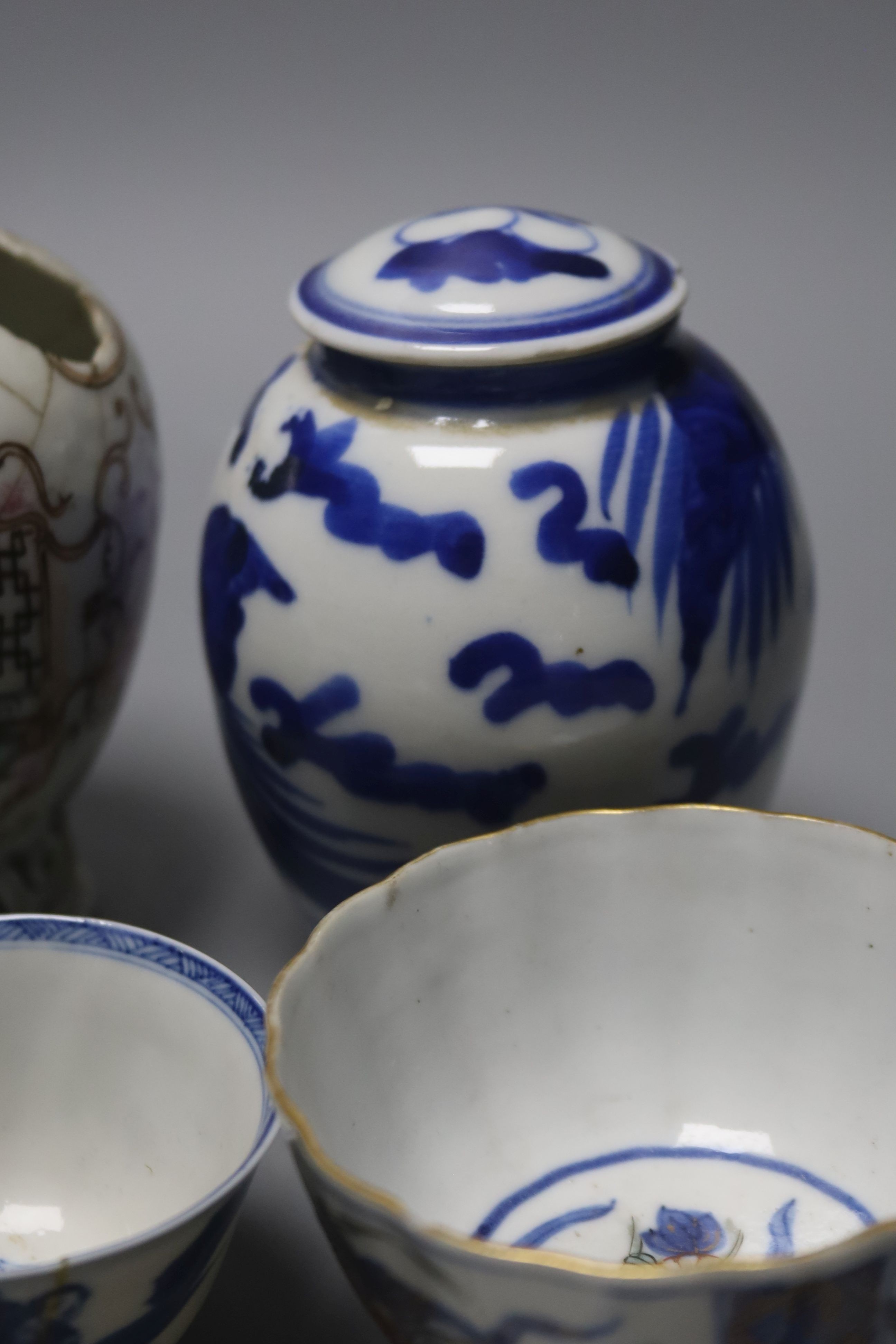 A group of Chinese enamelled porcelain vases and bowls, a similar blue-and-white jar and cover, 18th century and later